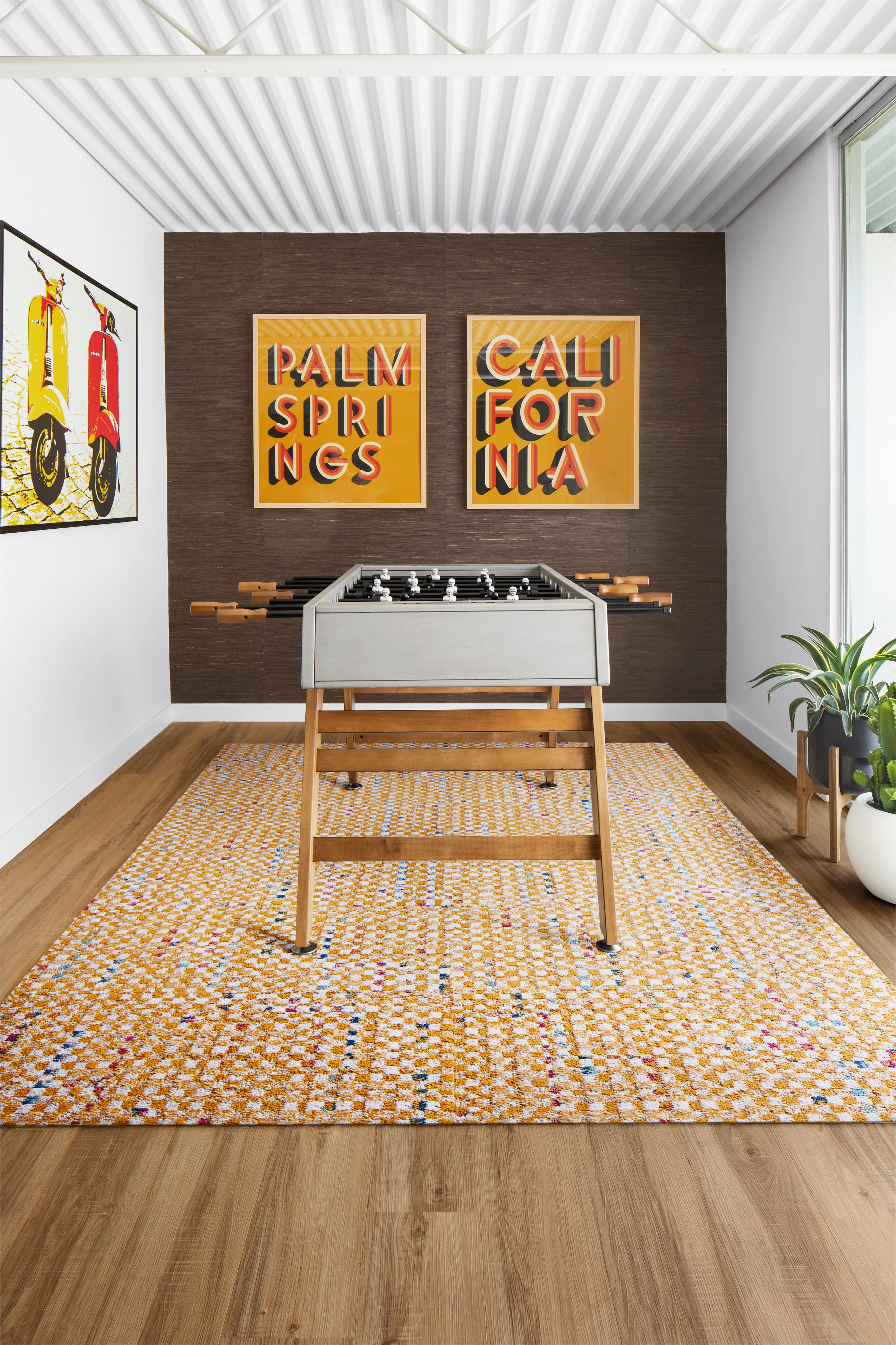 FLOR Check it Out carpet tile in recreation room with foosball table image number 2